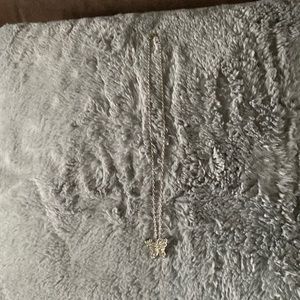 Silver butterfly necklace with clear rhinestones. 18 inch silver chain.